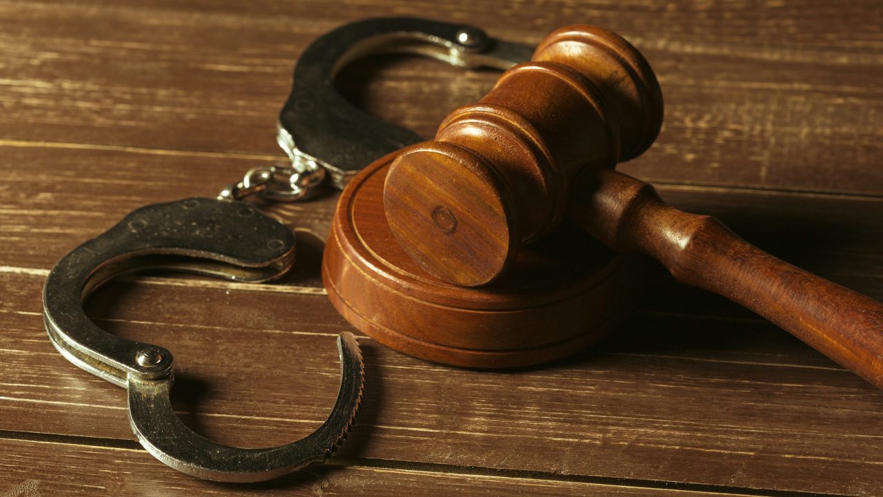 closeup-view-brown-wooden-mallet-judge-scaled.jpg
